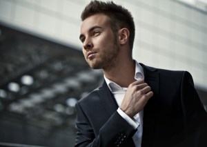 Portrait of businessman on background of office building