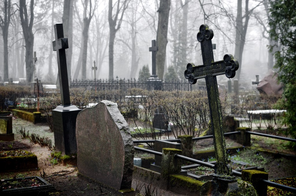 cross in fog at the cemetary