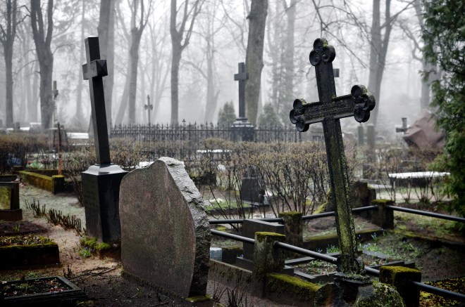 cross in fog at the cemetary